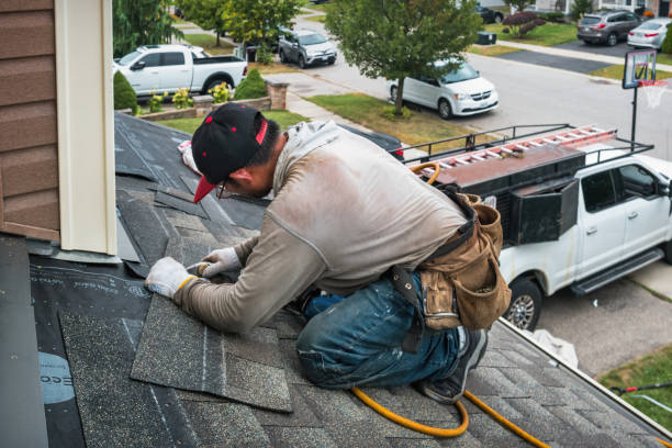 Professional Roofing technician working in Rose, NY